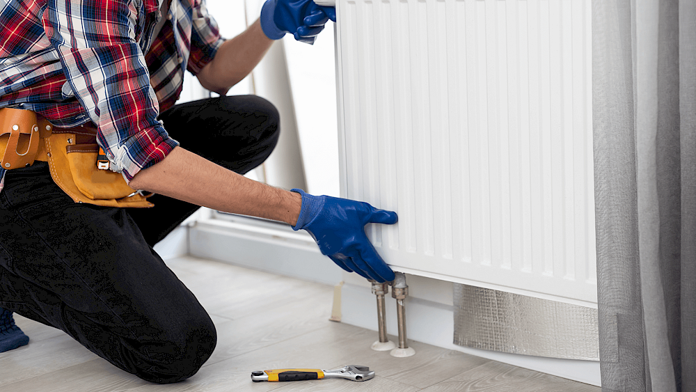 Modern central heating radiator fitted in home - request a quote