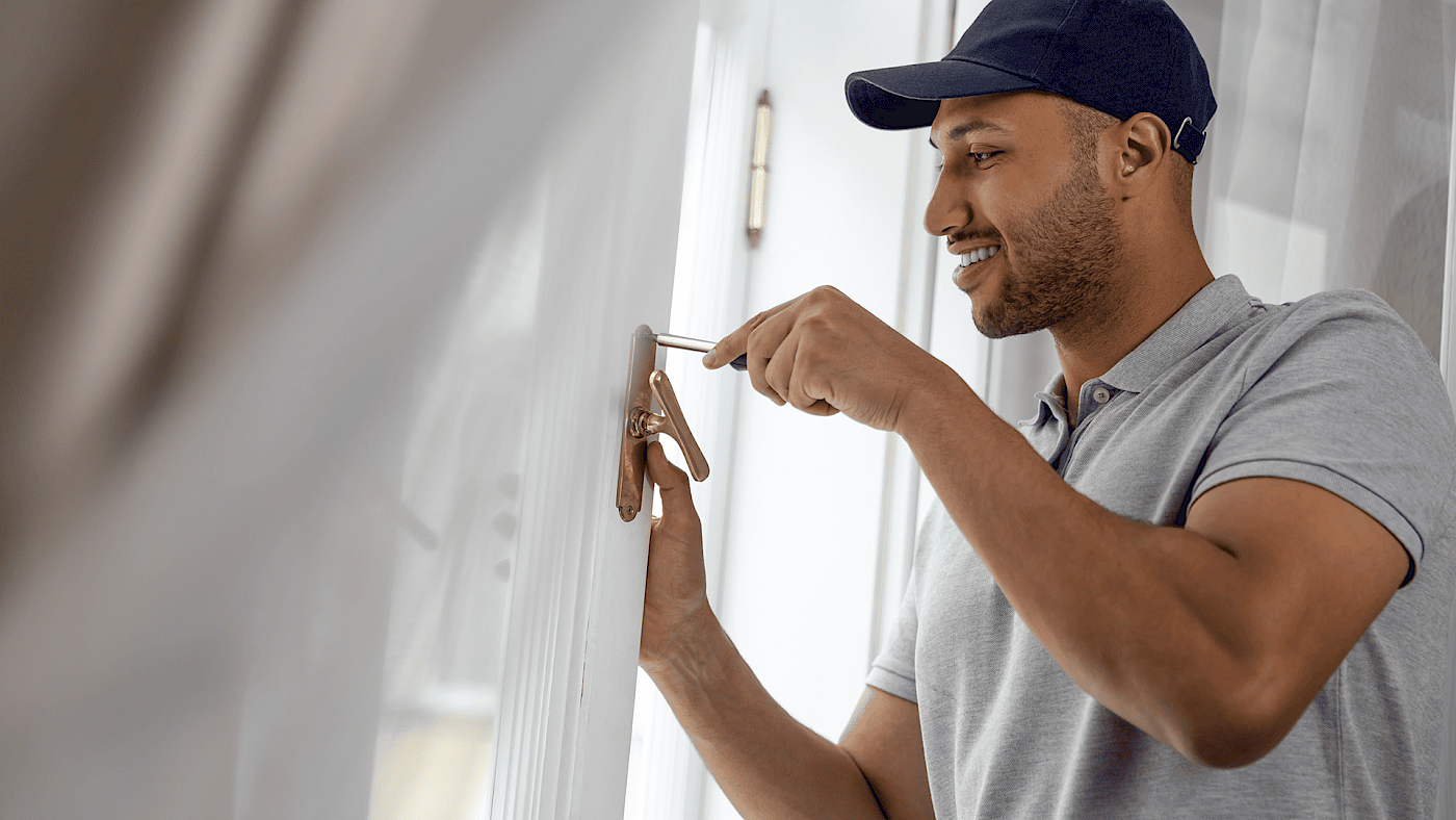 Handyman completing small home improvement project - request a quote