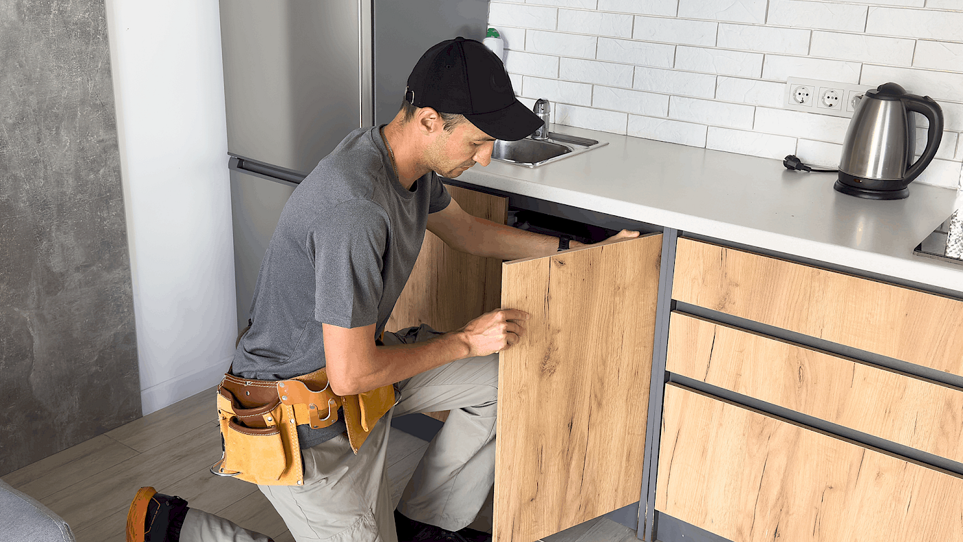 Cabinet fitting work by professional kitchen installer - request a quote