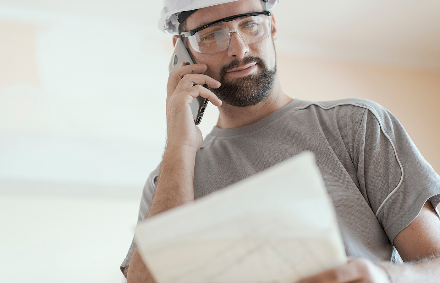 Construction worker on the phone
